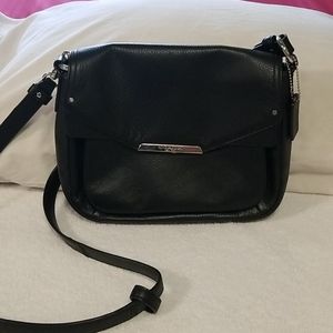 A black "Coach" purse